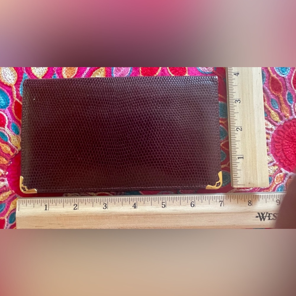 Beautiful Cartier Bordeaux burgundy leather wallet with gold hardware. EUC 7x4”